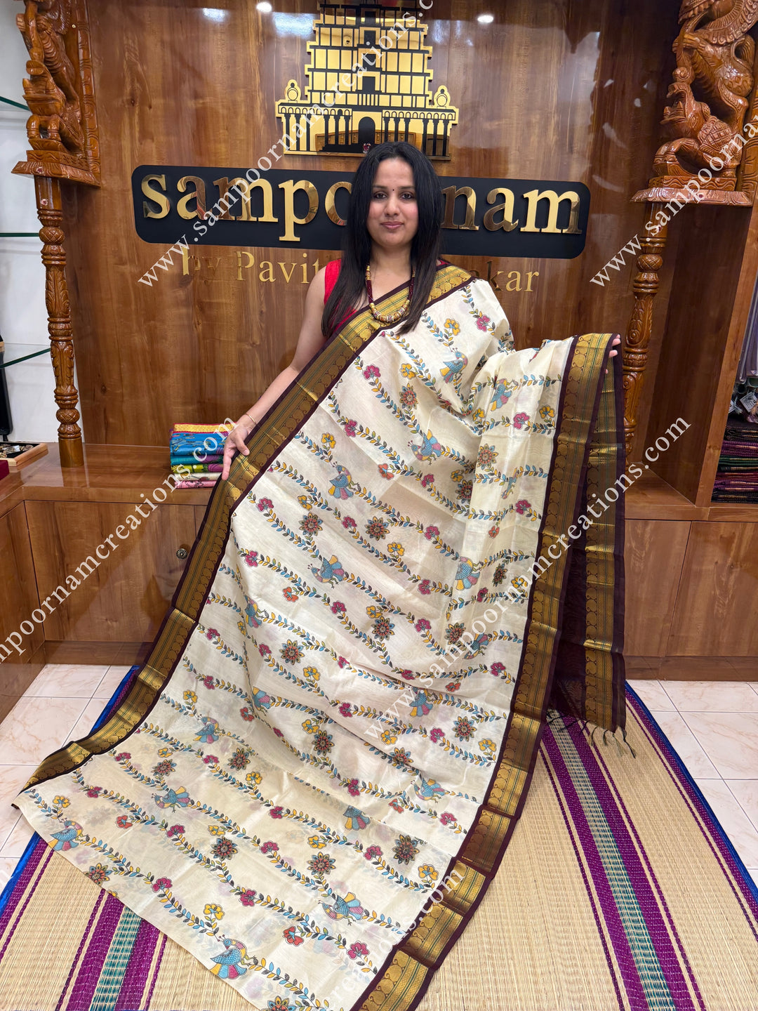 Off White with Wine, Floral Madhubani  Prints all over the body , traditional borders and rich Pallu Korvai Silk Cotton Saree