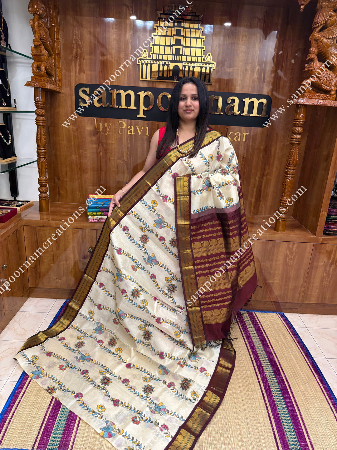 Off White with Wine, Floral Madhubani  Prints all over the body , traditional borders and rich Pallu Korvai Silk Cotton Saree