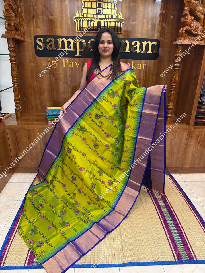 Sneha Green with Blue , Floral Madhubani  Prints all over the body , Tissue borders with Temple design and rich Pallu Korvai Silk Cotton Saree