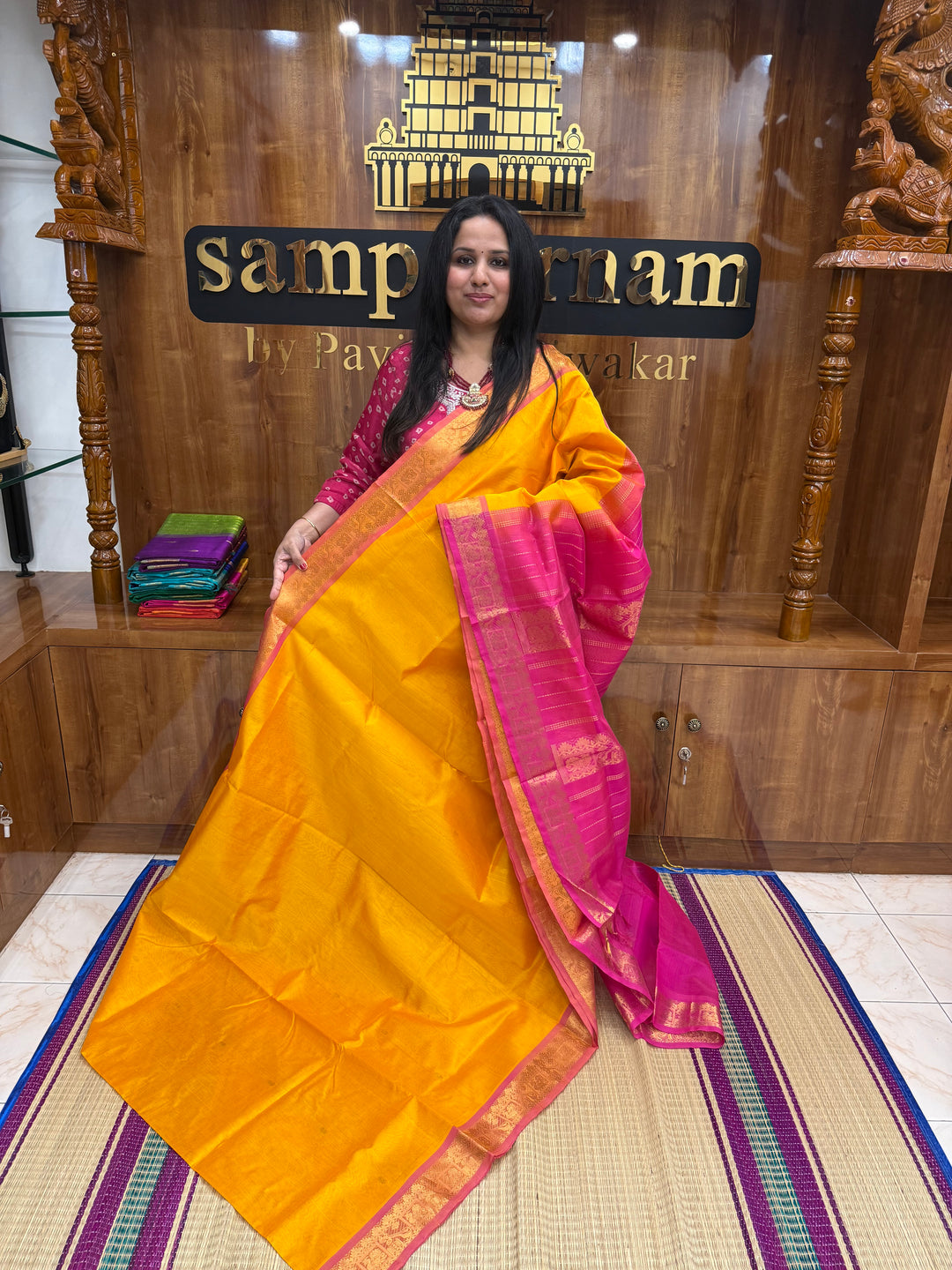 Mambazha Manjal with Pink , rich Zari butta in the body , Traditional Big Borders and rich Pallu  Silk Cotton Saree