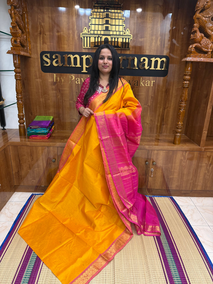 Mambazha Manjal with Pink , rich Zari butta in the body , Traditional Big Borders and rich Pallu  Silk Cotton Saree