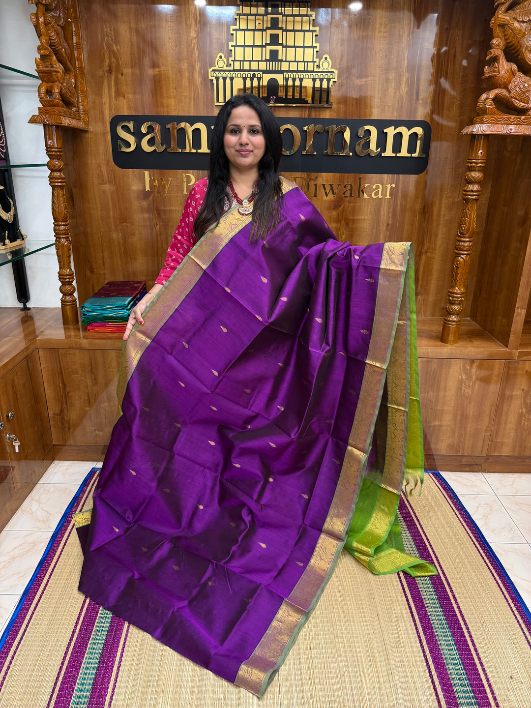Vadamalli with Green  , rich Thilagam  Zari butta in the body , Traditional Big Borders and rich Pallu  Silk Cotton Saree