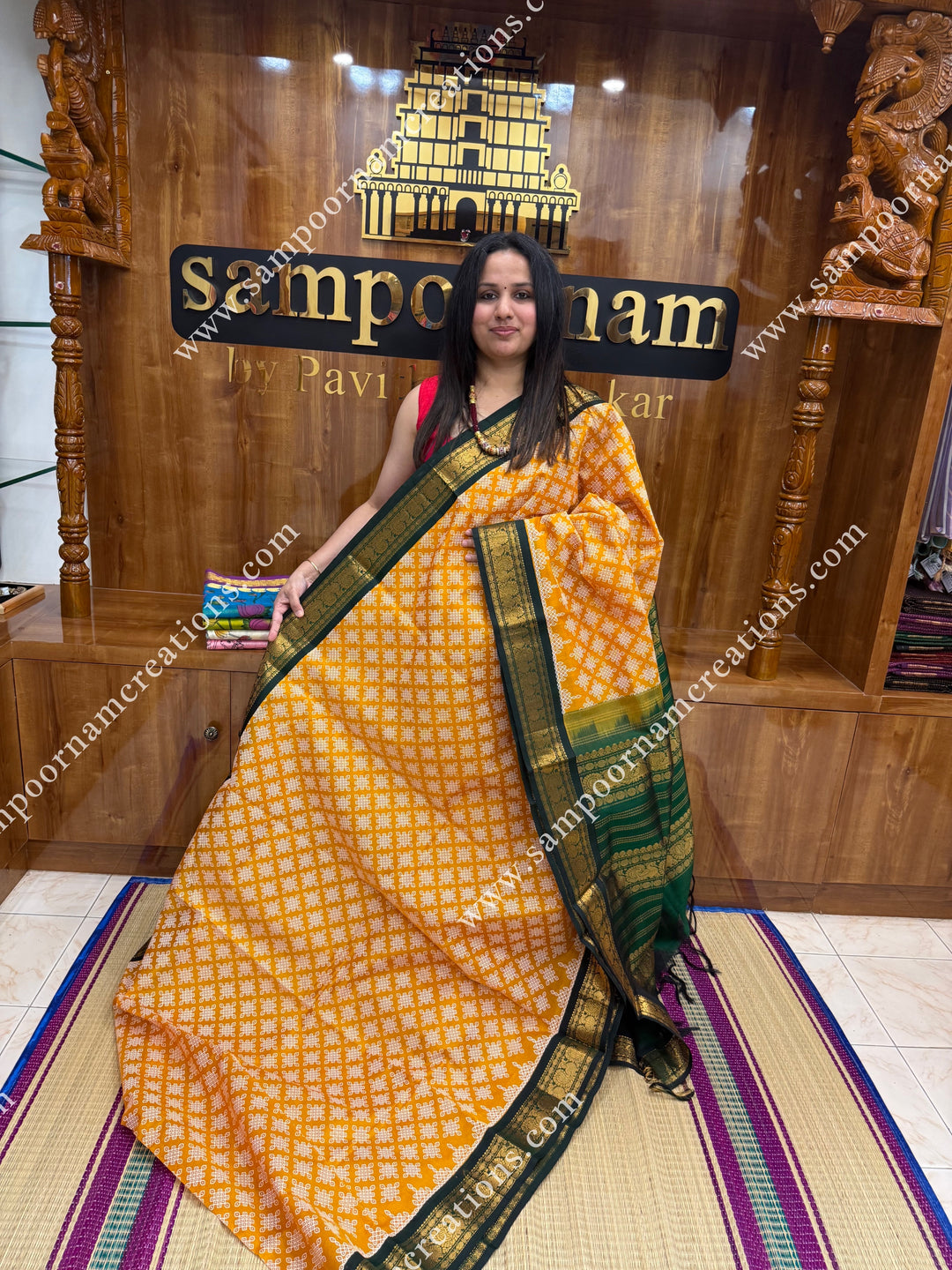 Gold Yellow with Green , Kolam Prints all over the body , traditional borders and rich Pallu Korvai Silk Cotton Saree