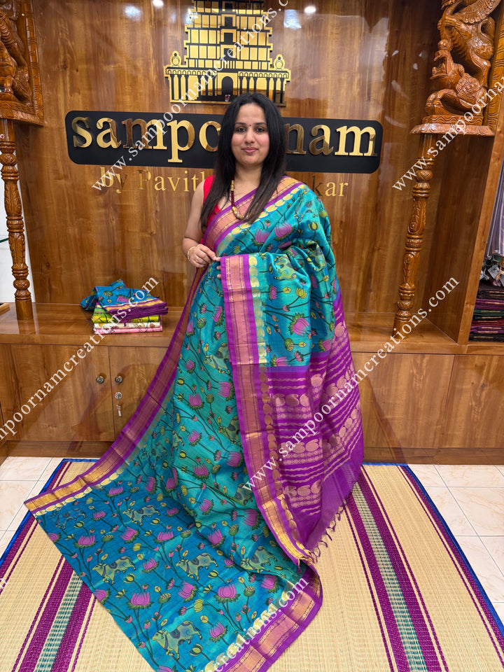 Greenish Blue with Magenta ,  Checks in the body and rettapet Borders and  rich Pallu Pichwai Printed Korvai Silk Cotton Saree