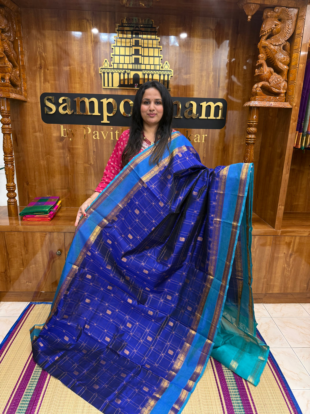 Royal Blue with Turquoise Blue  , Zari Checks with Chakram and Mayil butta in the body , Traditional borders and  rich Pallu Silk Cotton Saree