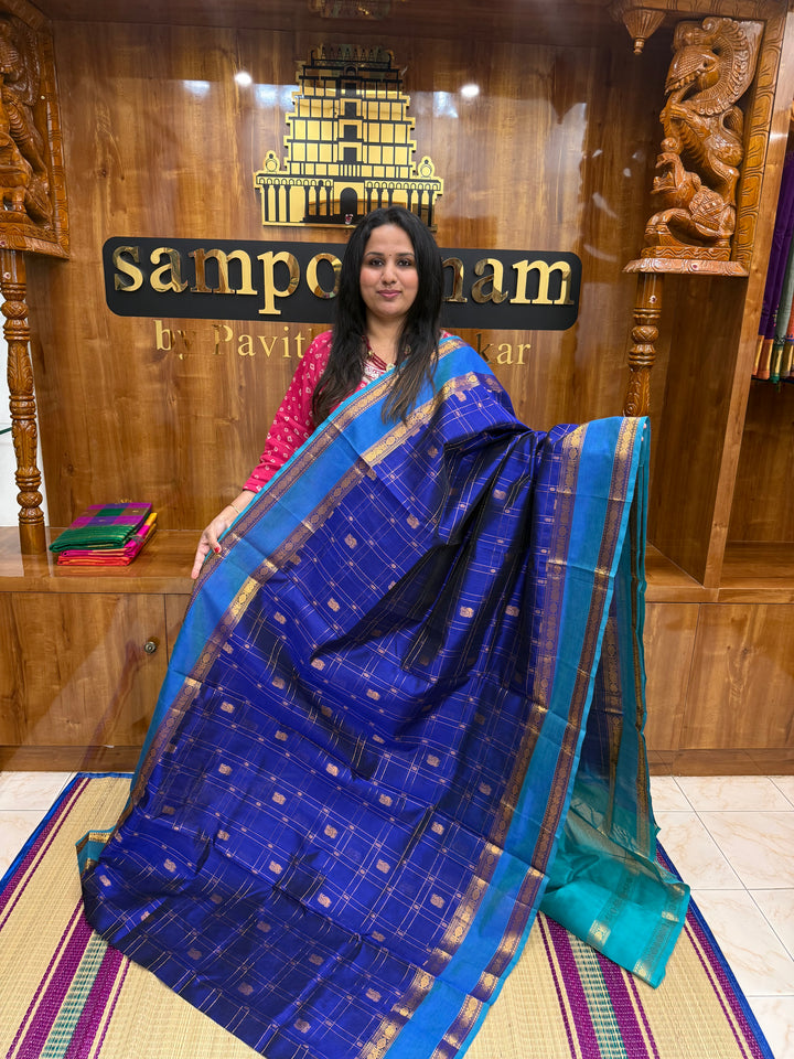 Royal Blue with Turquoise Blue  , Zari Checks with Chakram and Mayil butta in the body , Traditional borders and  rich Pallu Silk Cotton Saree