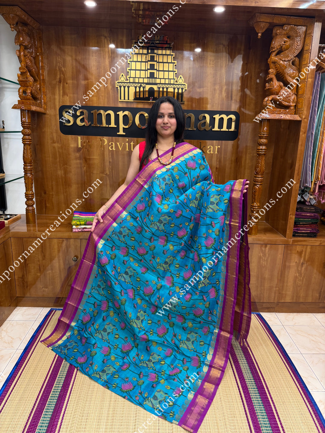 Ocean Blue with Magenta , Checks in the body and rettapet  Borders , rich Pallu Pichwai Printed Korvai Silk Cotton Saree