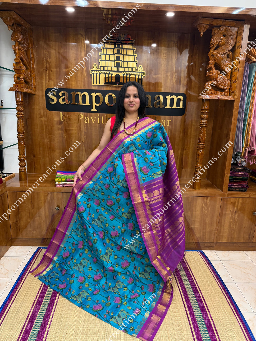Ocean Blue with Magenta , Checks in the body and rettapet  Borders , rich Pallu Pichwai Printed Korvai Silk Cotton Saree