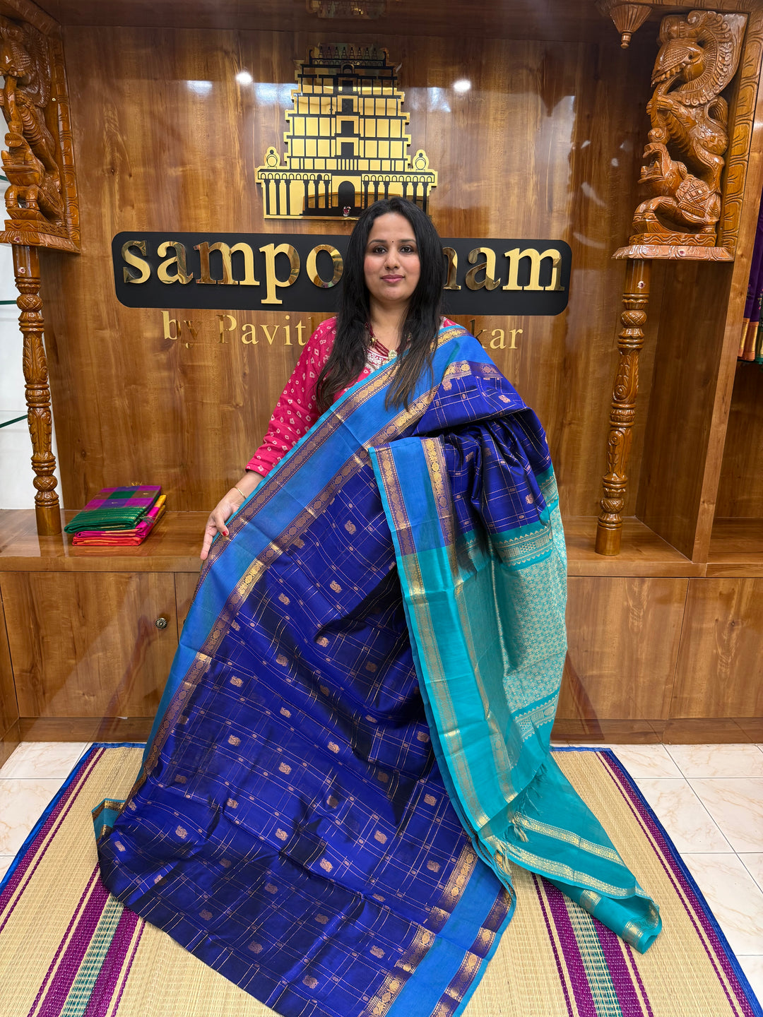Royal Blue with Turquoise Blue  , Zari Checks with Chakram and Mayil butta in the body , Traditional borders and  rich Pallu Silk Cotton Saree