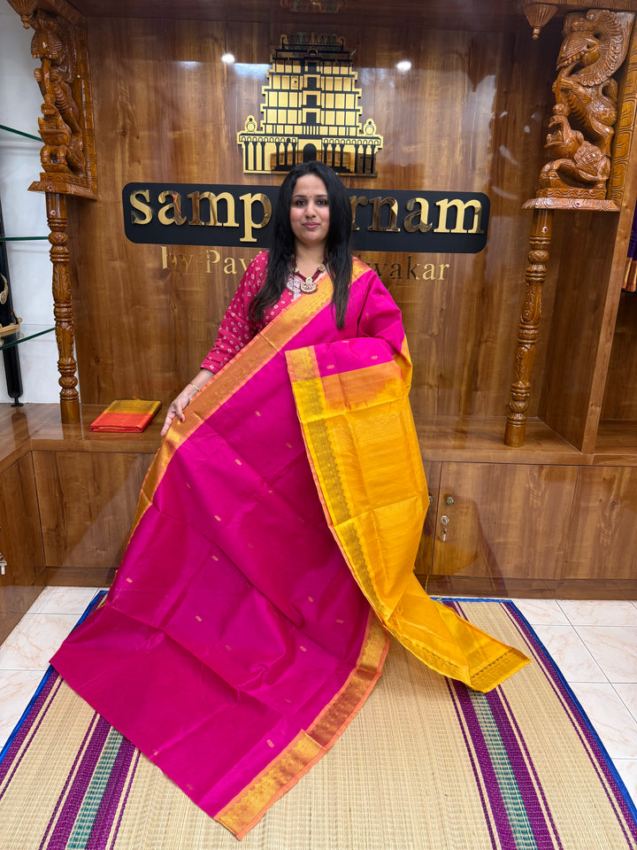Pink with Mustard  , rich Mango Zari butta in the body , Traditional Big Borders and rich Pallu  Silk Cotton Saree