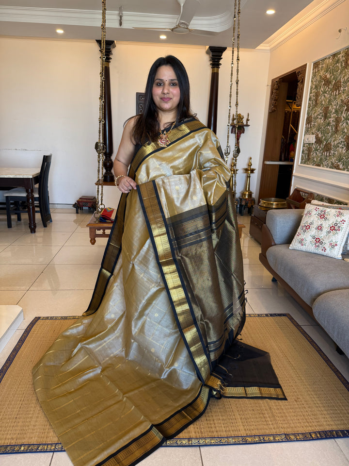Light Gold with Black Rich Zari Checks with Butta in the Body, Traditional borders and Rich Pallu Korvai Silk Cotton Saree