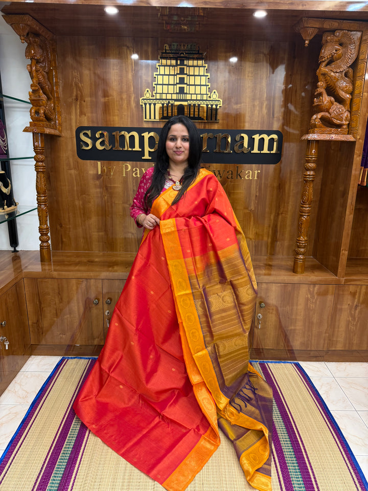 Orange with Light Brown , rich Zari butta in the body , Traditional Big Borders and rich Pallu  Silk Cotton Saree