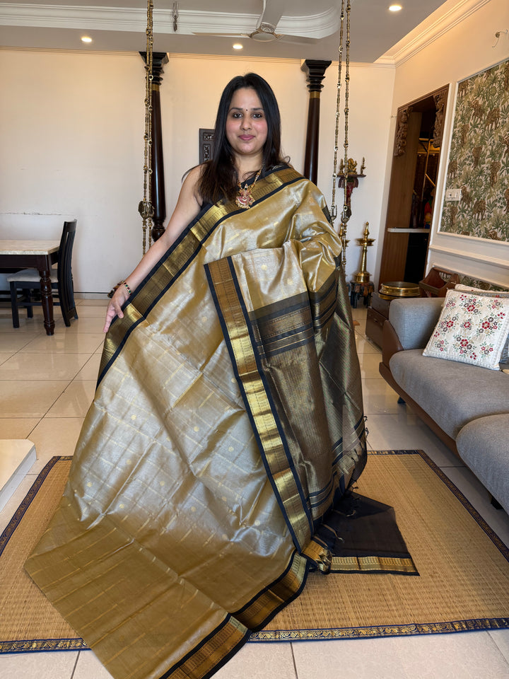 Light Gold with Black Rich Zari Checks with Butta in the Body, Traditional borders and Rich Pallu Korvai Silk Cotton Saree