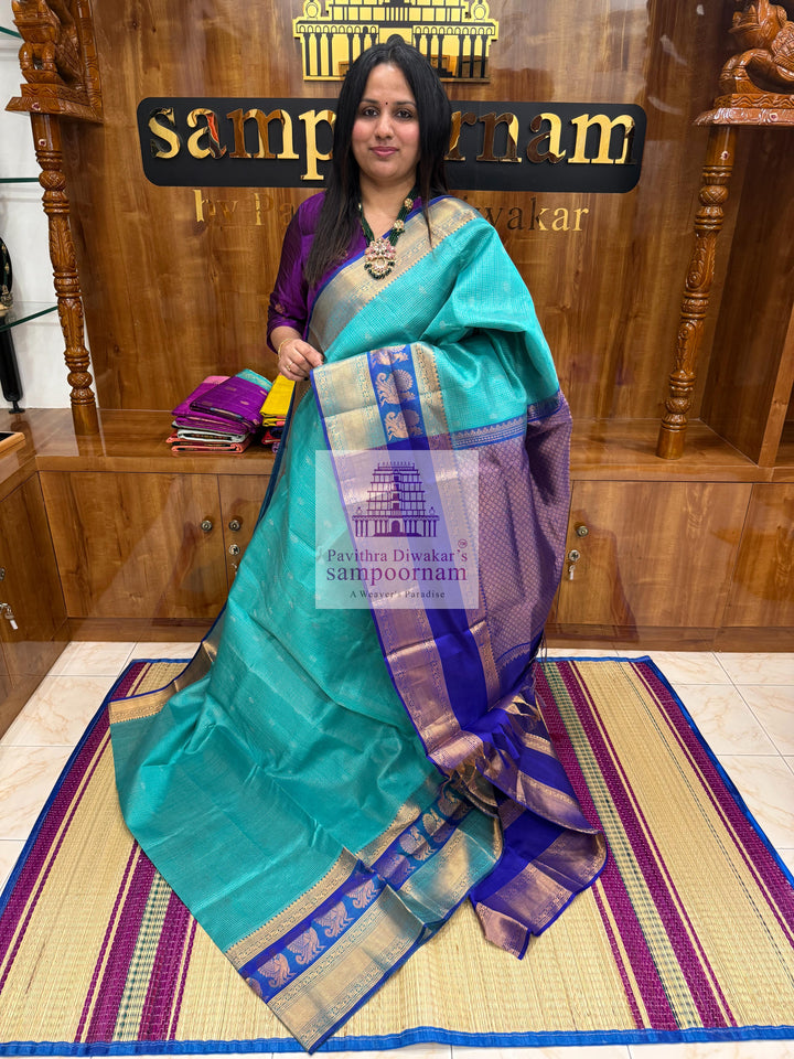 Light Blue with Dark Blue , Zari Podi Kattam in the body , one side big Satin Border with Annam motif , traditoinal border and Grand Pallu Korvai Silk Cotton Saree