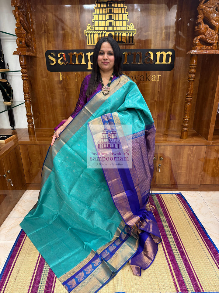 Light Blue with Dark Blue , Zari Podi Kattam in the body , one side big Satin Border with Annam motif , traditoinal border and Grand Pallu Korvai Silk Cotton Saree