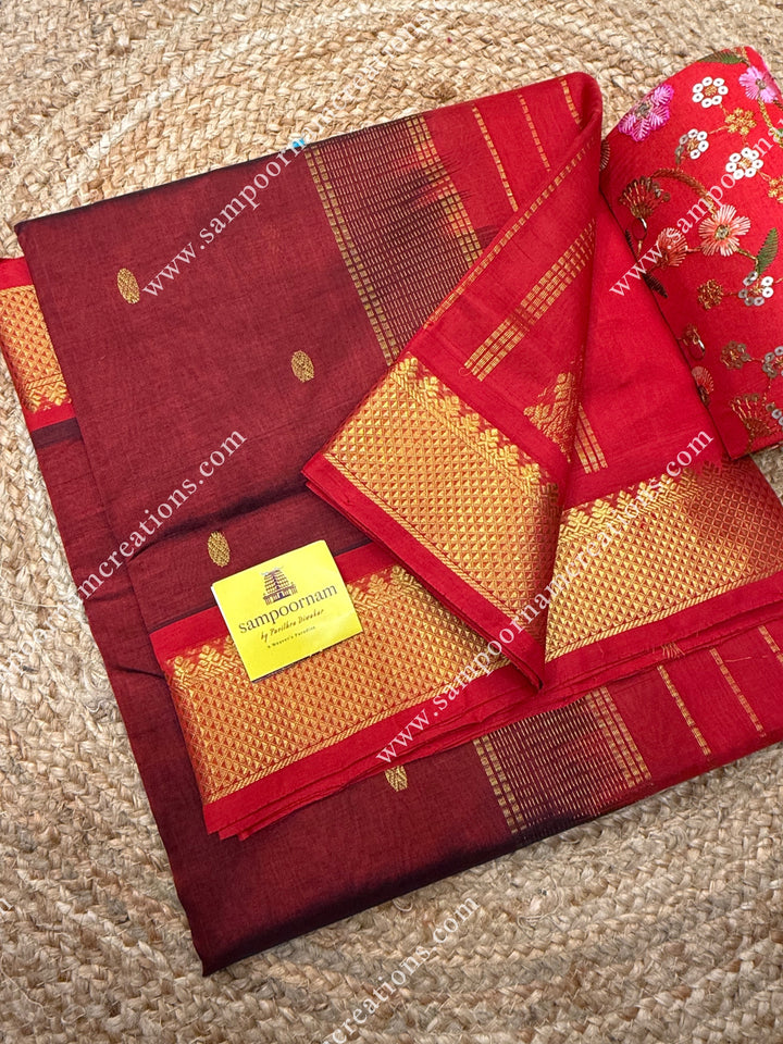 Marron with Red  , Rich Zari Butta in the body , traditional borders and rich Pallu Silk Cotton Saree
