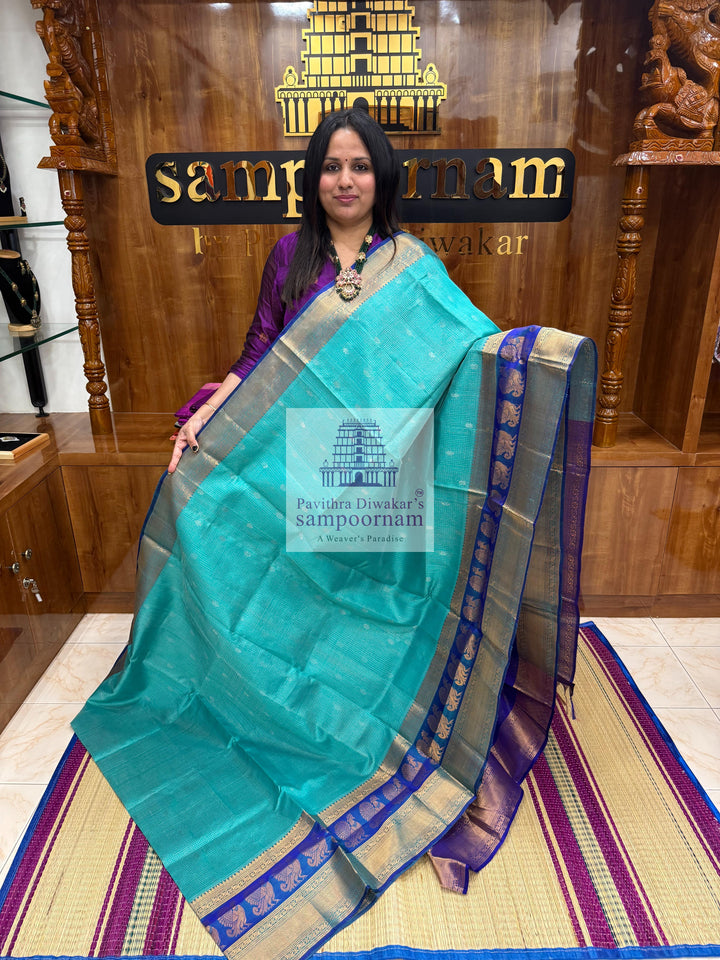 Light Blue with Dark Blue , Zari Podi Kattam in the body , one side big Satin Border with Annam motif , traditoinal border and Grand Pallu Korvai Silk Cotton Saree