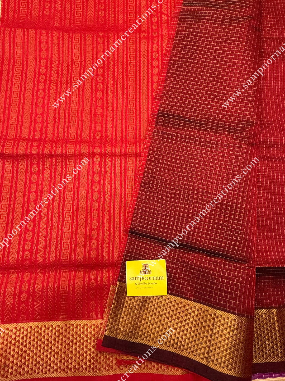 Maroon with Red , Rich Zari Checks in the body , traditional borders and rich Pallu Silk Cotton Sarees