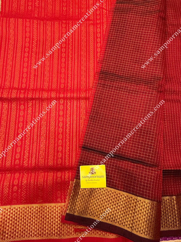 Maroon with Red , Rich Zari Checks in the body , traditional borders and rich Pallu Silk Cotton Sarees