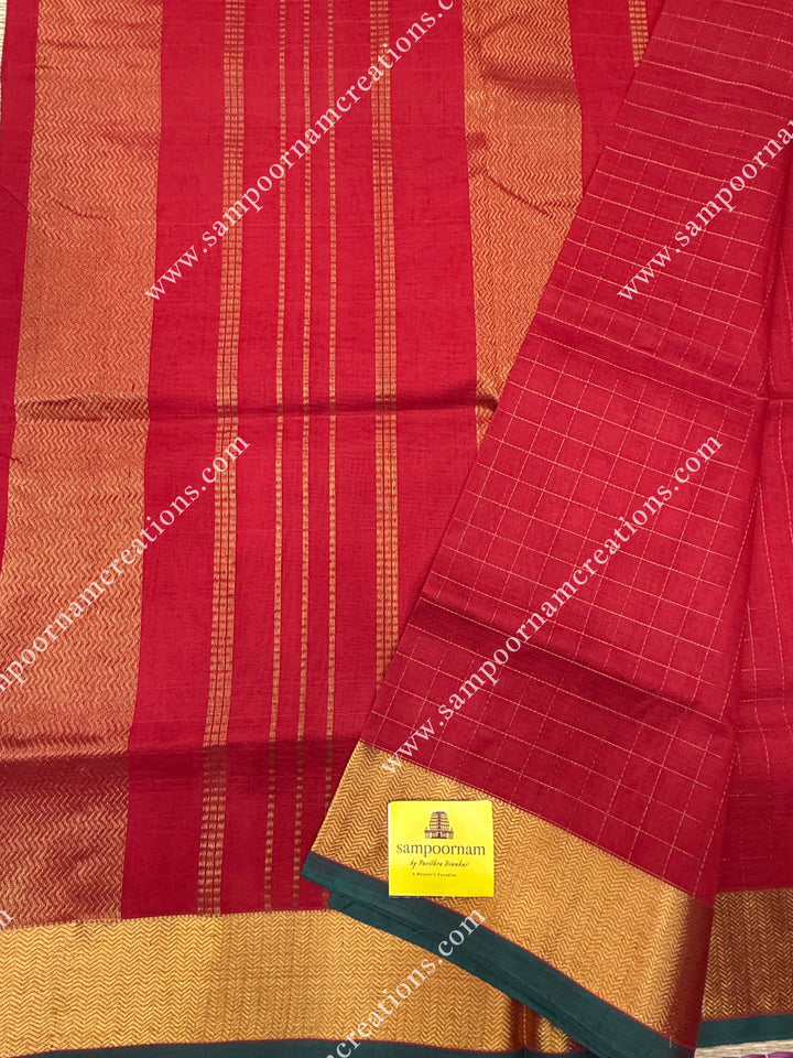 Classic Red  , Green Selvedge , Rich Zari Checks in the body , traditional borders and rich Pallu Silk Cotton Saree