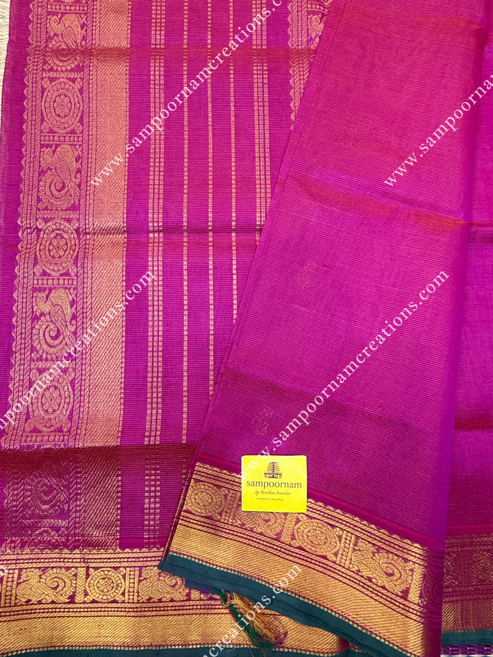 Rani Pink , Green Selvedge , Vairaoosi Zari lines and Mango Zari Butta in the body , traditional borders and rich Pallu Silk Cotton Sarees