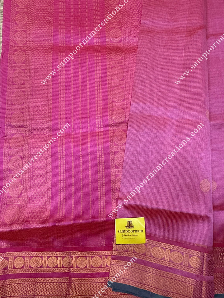 Baby Pink , Green Selvedge , Vairaoosi Zari lines and Rich Zari Butta in the body , traditional borders and rich Pallu Silk Cotton Sarees