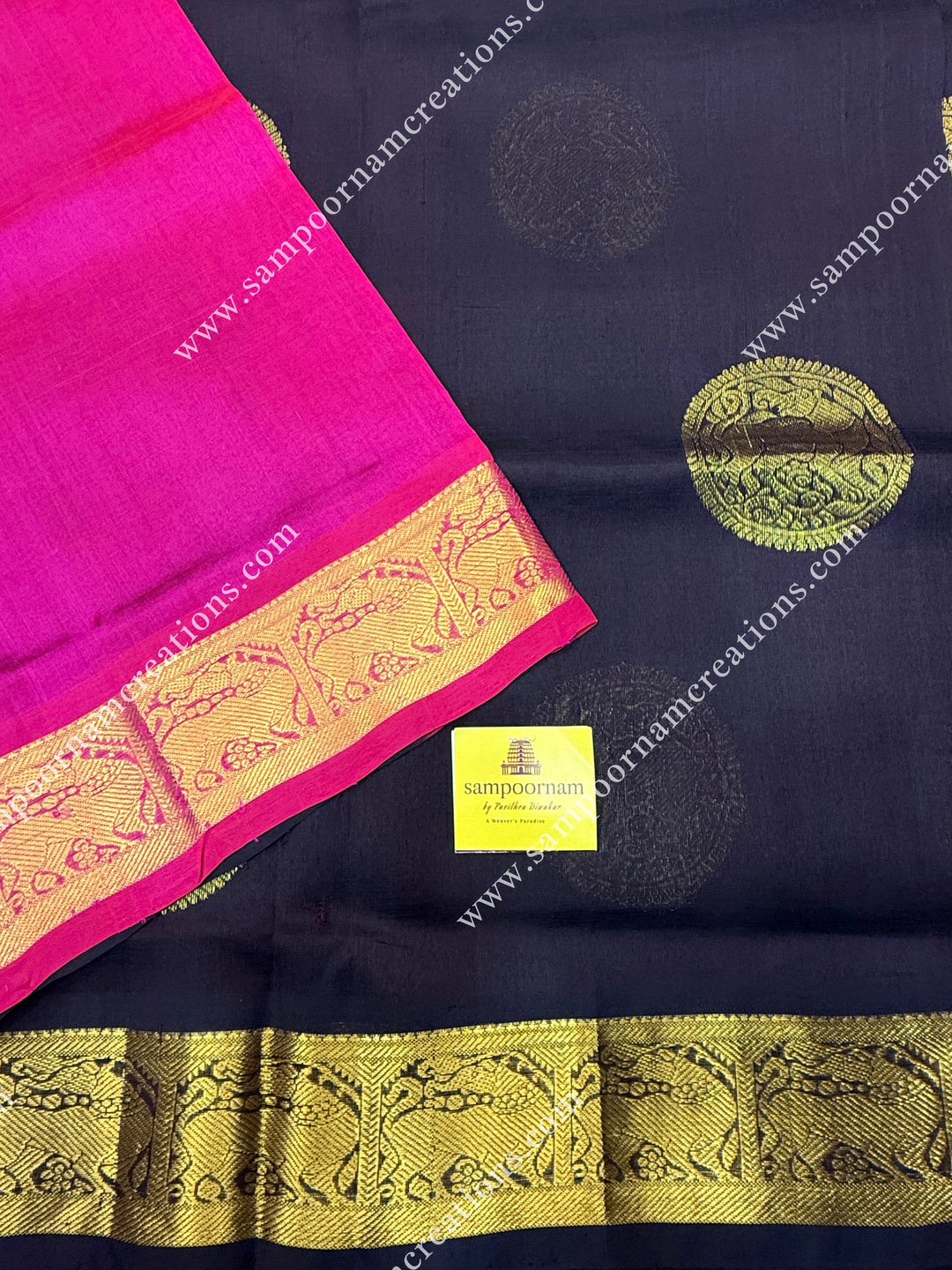 Dark Brown with Pink , Round Yazhi Zari motif in the body , traditional borders and rich Pallu Silk Cotton Saree