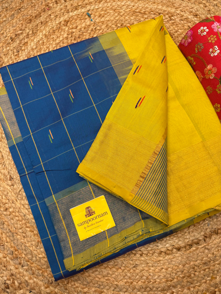 Teel Blue with Lemon Green , checks in the body and rain drop thread butta in the body and Pallu Semi Silk Cotton Saree