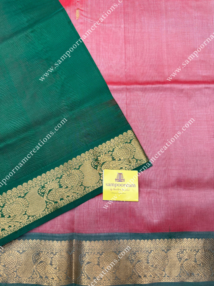 Peach with Green  , Rich Zari Butta in the body , traditional borders and rich Pallu Silk Cotton Saree