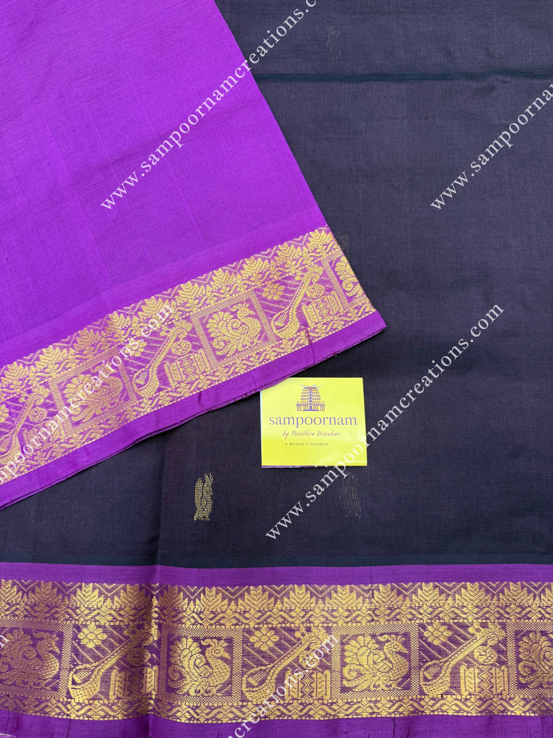 Dark Brown with Magenta , Rich Annam Zari Butta in the body , traditional borders and rich Pallu Silk Cotton Saree