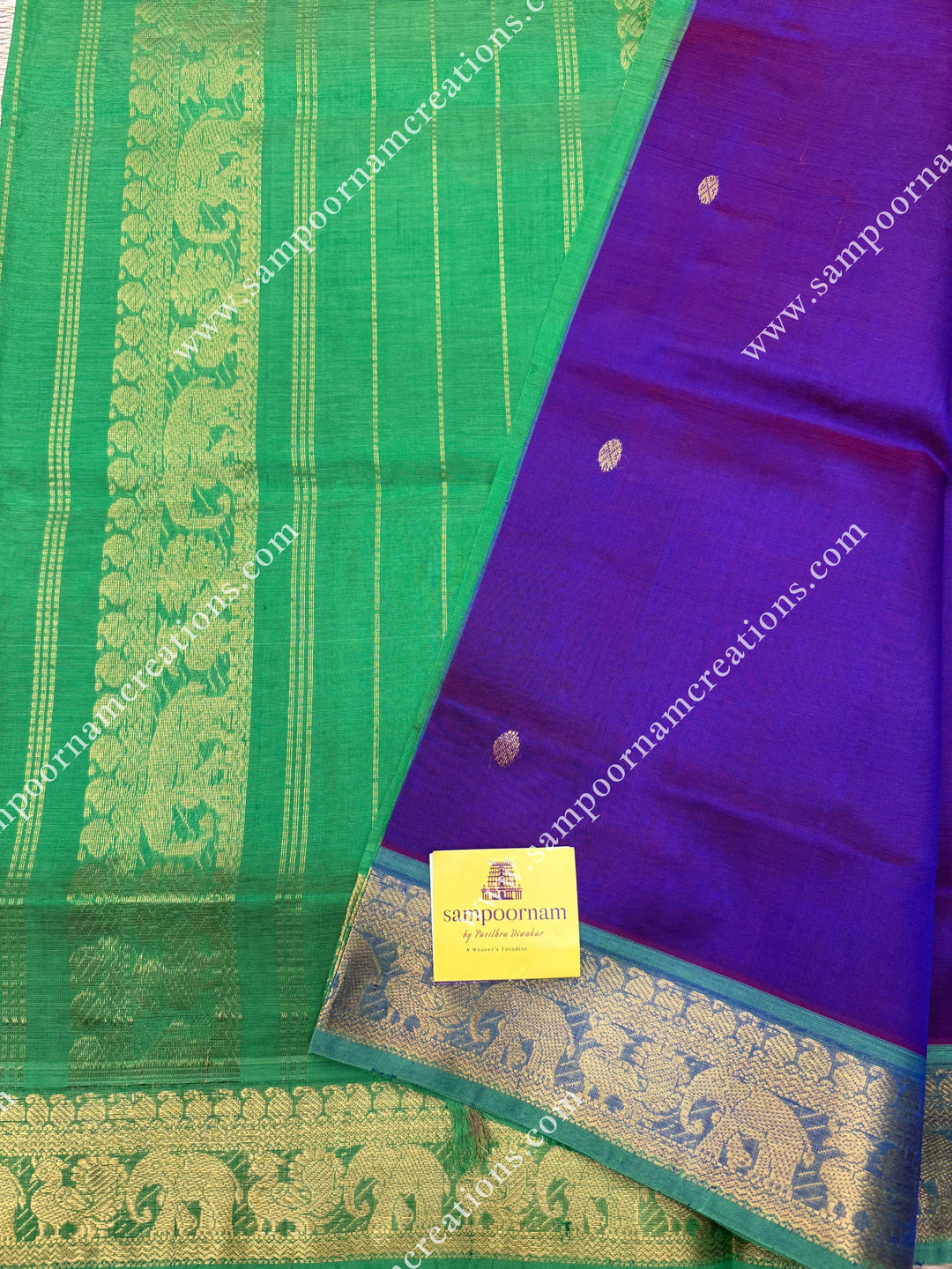 Vadamalli with Parrot Green  , Rich Zari Butta in the body , traditional borders and rich Pallu Silk Cotton Saree