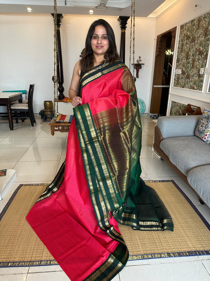 Orange And Magenta Podi Kattam with Green Rettapet Border and Rich Zari Pallu Korvai Silk Cotton Saree