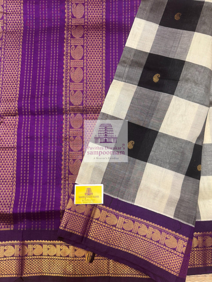 Black and White with Purple , Paalum Pazham Kattam checks with rich butta , traditional borders and rich Pallu Korvai Silk Cotton Saree