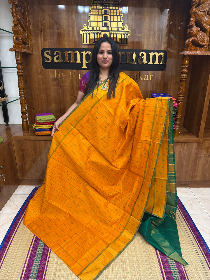 Orange with Green , checks in the body and rain drop thread butta in the body and Pallu Semi Silk Cotton Saree