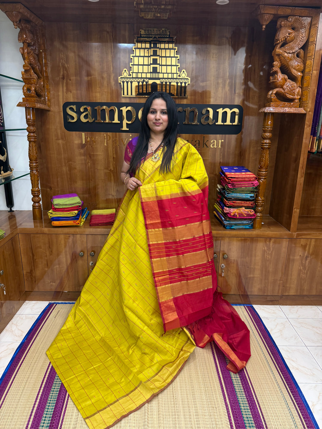 Yellow with Red , checks in the body and rain drop thread butta in the body and Pallu Semi Silk Cotton Saree