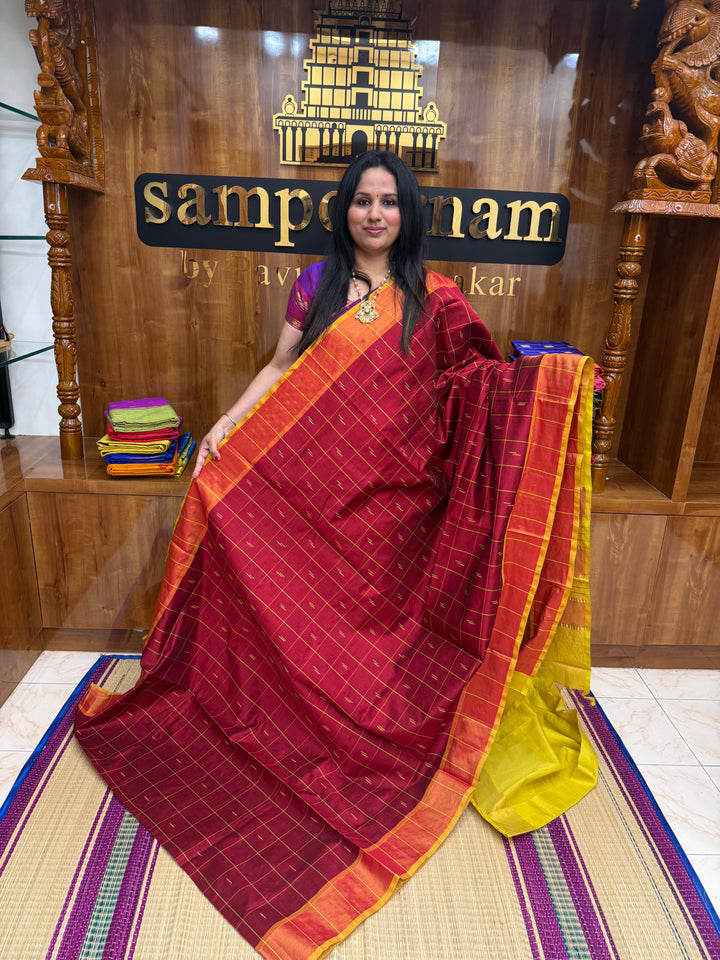 Maroon with Yellow , checks in the body and rain drop thread butta in the body and Pallu Semi Silk Cotton Saree