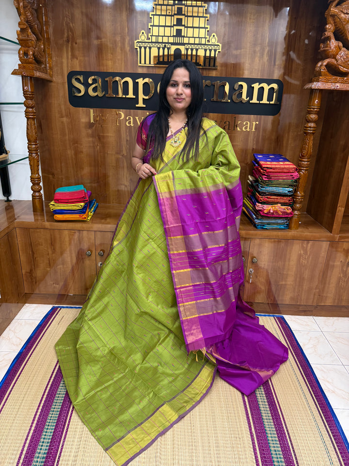 Elaichi Green with Purple , checks in the body and rain drop thread butta in the body and Pallu Semi Silk Cotton Saree