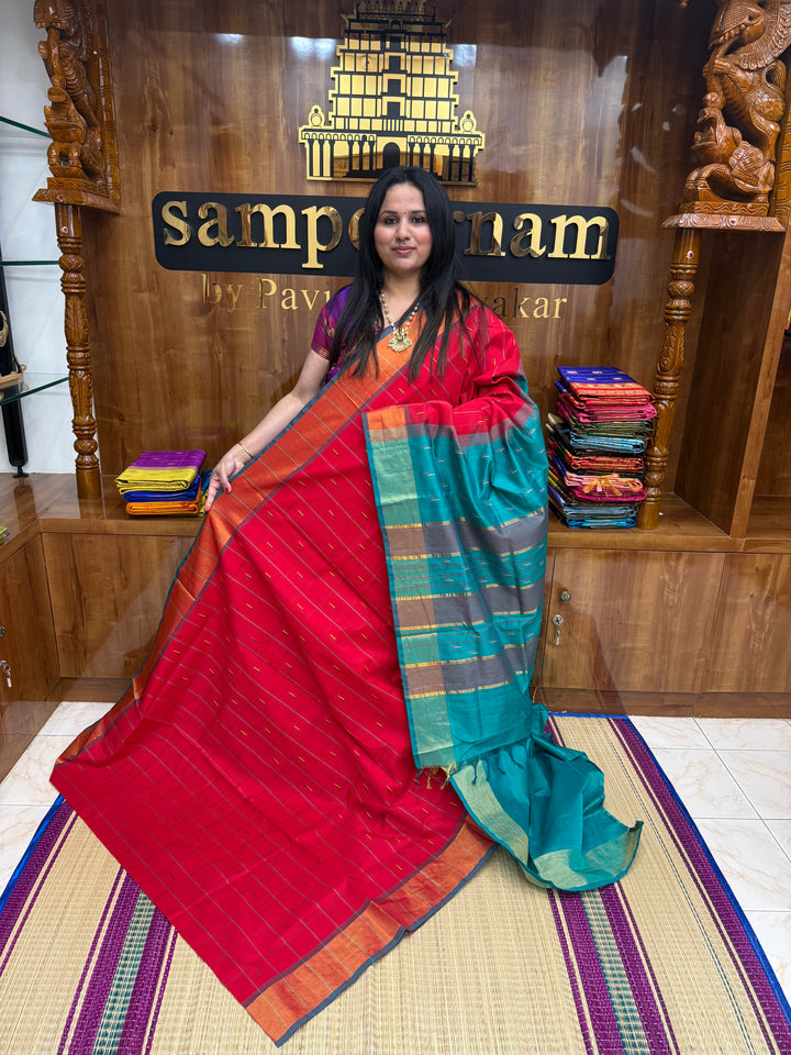 Red with Green , checks in the body and rain drop thread butta in the body and Pallu Semi Silk Cotton Saree