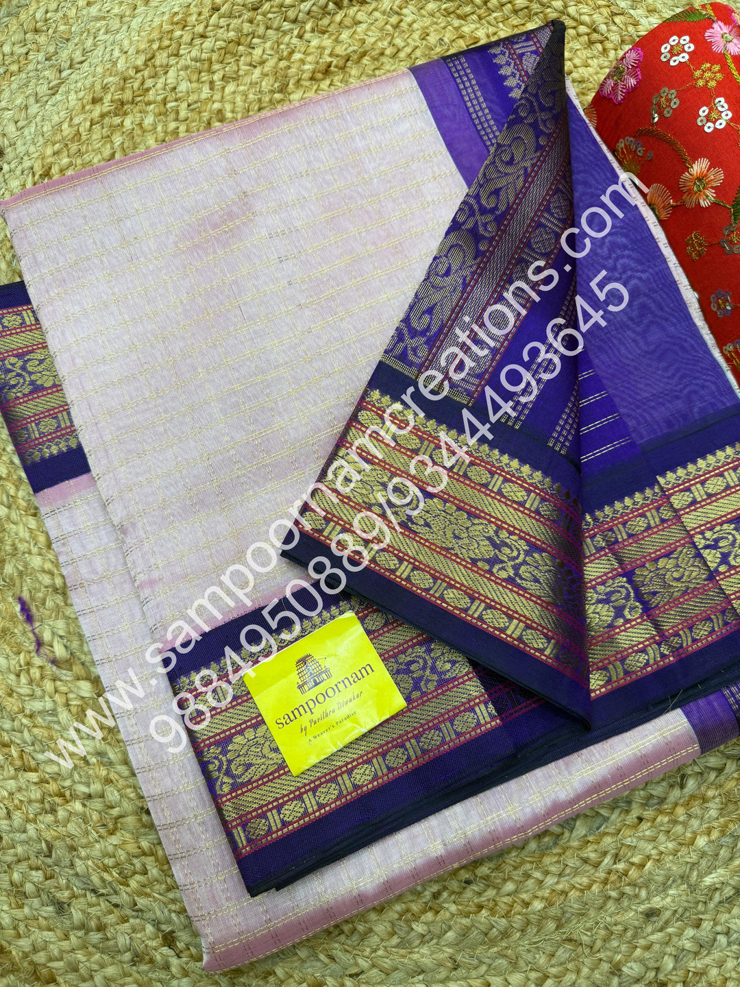 Baby Pink with Purple , rich Zari checks in the body , traditional borders and rich Pallu Korvai Silk Cotton