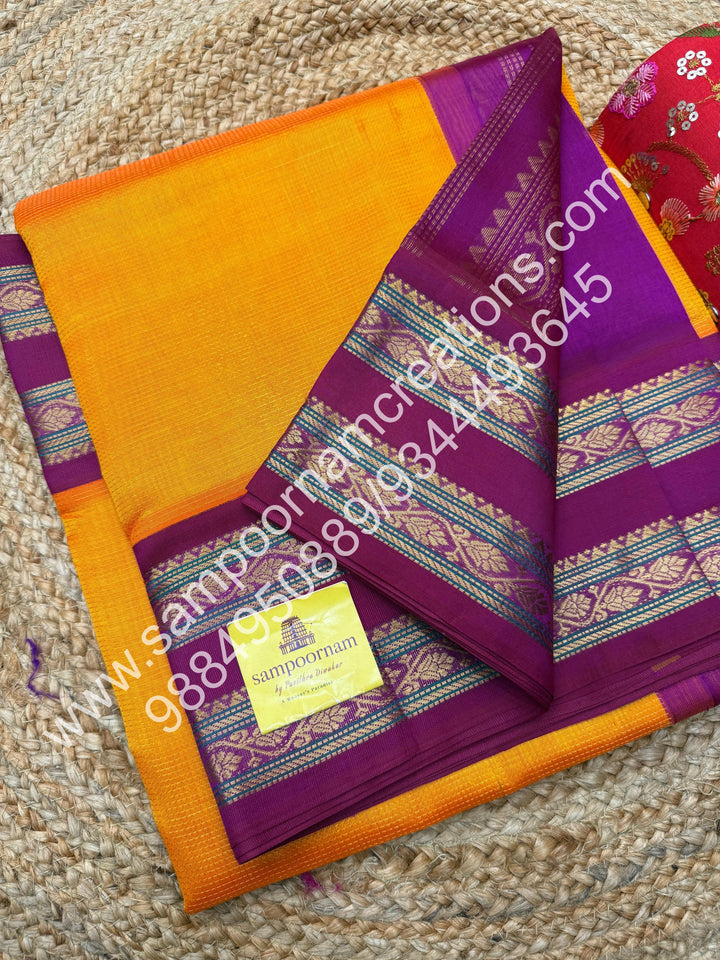 Mambazha Manjal with Magenta  , rich Zari Podi Kattam  in the body , traditional borders and rich Pallu Korvai Silk Cotton