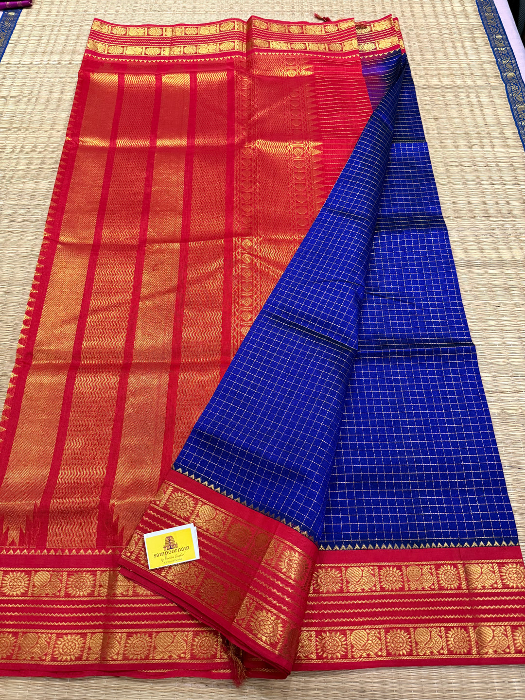 Blue with Red, rich Zari checks in the body ,rettapet border and grand Korvai Silk Cotton Saree