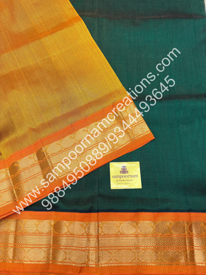 Dark Green with Manjal , Vairaoosi Zari Lines in the body , Traditional borders and rich Pallu Korvai Silk Cotton