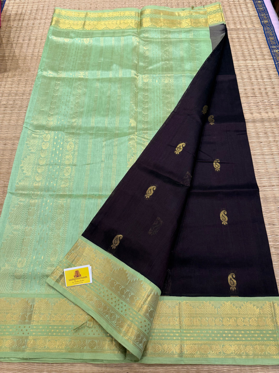 Dark Brown with Pastel Green , Lakshadeepam borders and rich Pallu , Zari butta in the body Korvai Silk Cotton Saree
