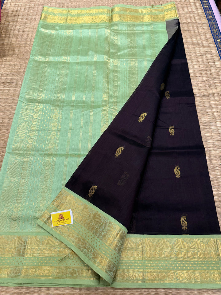 Dark Brown with Pastel Green , Lakshadeepam borders and rich Pallu , Zari butta in the body Korvai Silk Cotton Saree