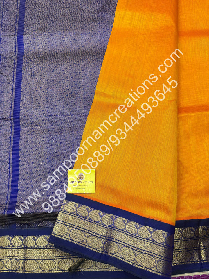 Mambazha Manjal with Dark Blue , Vairaoosi Zari Lines in the body , Traditional borders and rich Pallu Korvai Silk Cotton