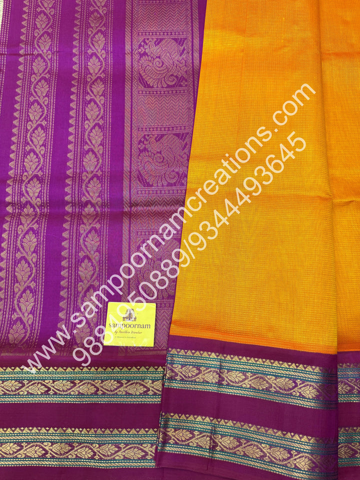 Mambazha Manjal with Magenta  , rich Zari Podi Kattam  in the body , traditional borders and rich Pallu Korvai Silk Cotton