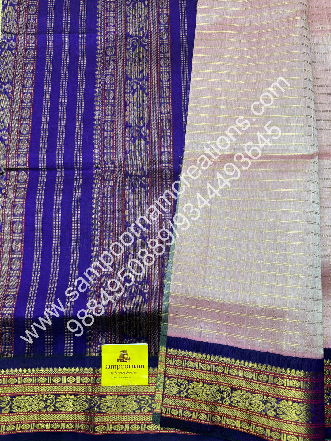 Baby Pink with Purple , rich Zari checks in the body , traditional borders and rich Pallu Korvai Silk Cotton