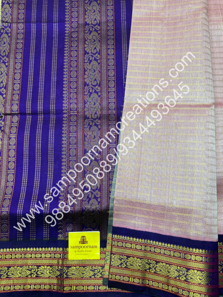 Baby Pink with Purple , rich Zari checks in the body , traditional borders and rich Pallu Korvai Silk Cotton