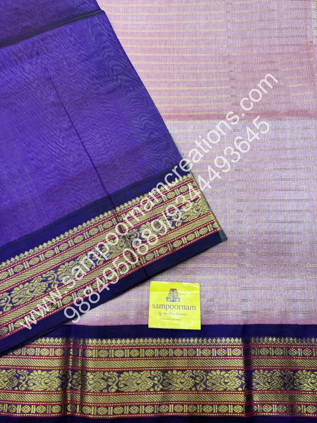 Baby Pink with Purple , rich Zari checks in the body , traditional borders and rich Pallu Korvai Silk Cotton