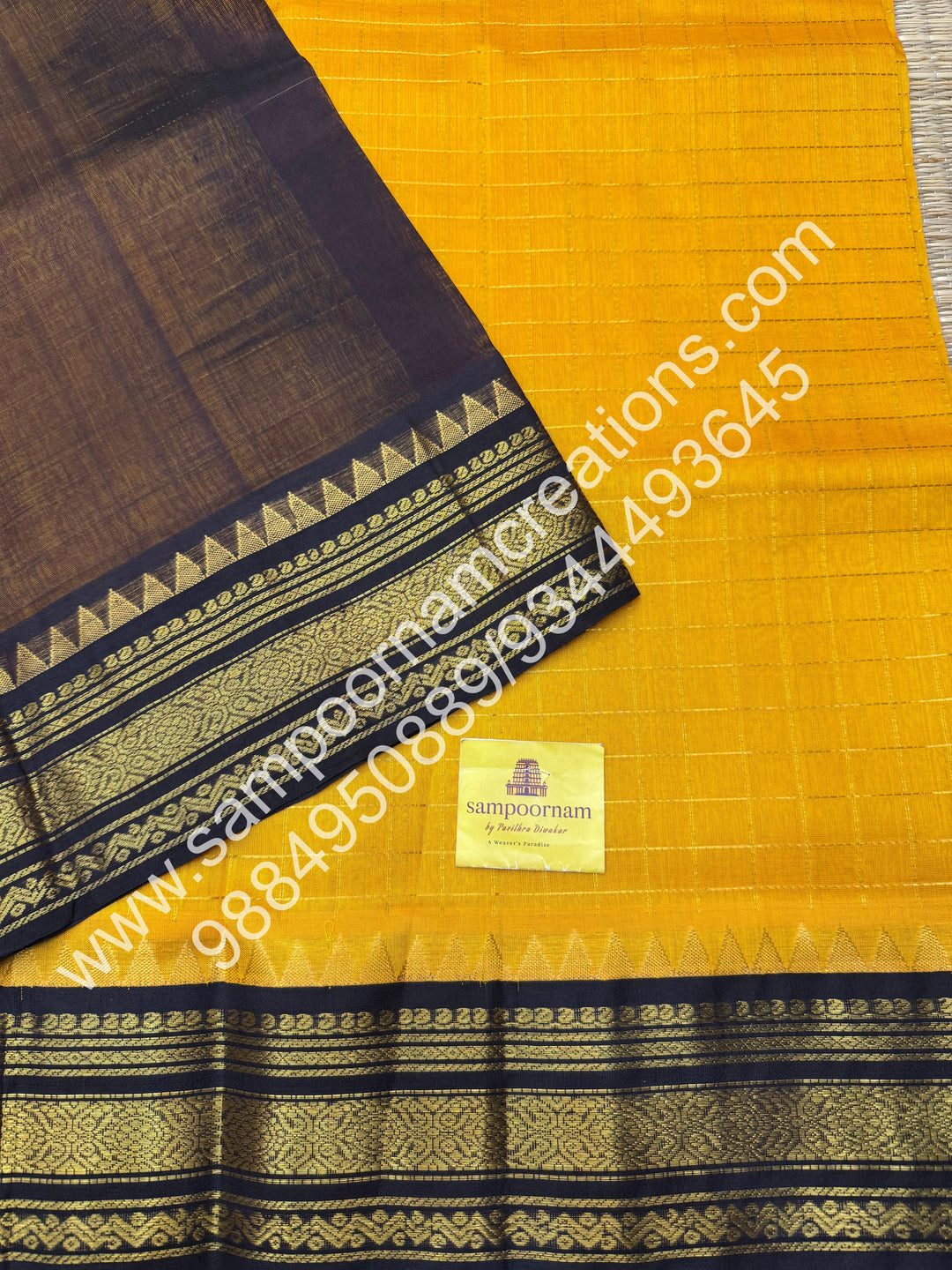 Manjal with Dark Brown  , rich Zari checks in the body , traditional borders and rich Pallu Korvai Silk Cotton